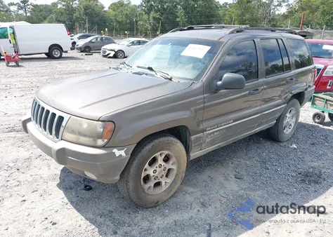 2000 Jeep Grand Cherokee Laredo из США, поврежденный, VIN 1J4GW48S4YC117286